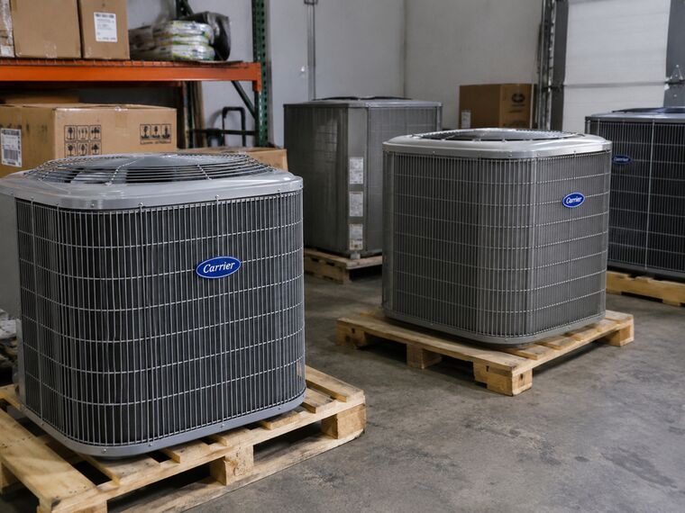 Carrier condensing units on pallets in our warehouse