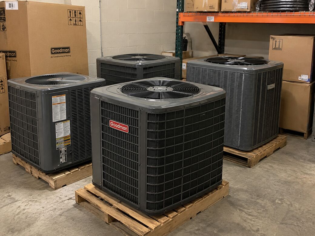 Goodman condensing units on pallets in our warehouse